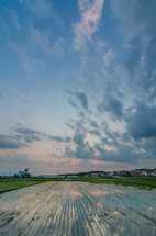 Clouds over a rice field. 