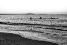 kayaking along a beach shore 