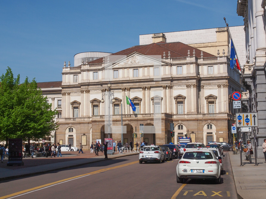 MILAN, ITALY - APRIL 10, 2014: Tourists in front of Teatro Alla Scala aka La Scala world famous opera house