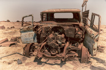old rusty abandoned truck in a desert 