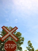Stop sign at railroad crossing.