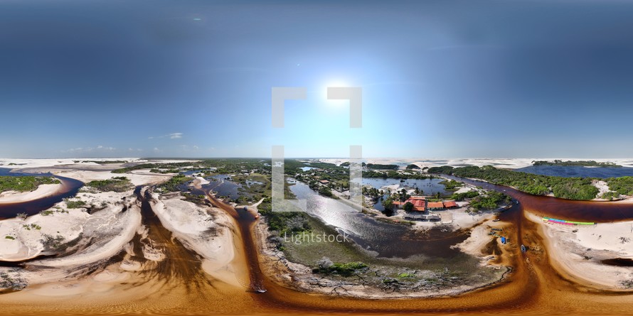 360 aerial photo taken with drone of several restaurants along the Rio Grande River in the Lençóis Maranhenses National Park on north coast of Brazil