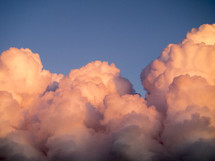 Pink cloud formations and blue sky.