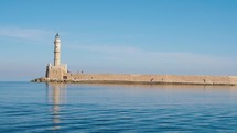 Chania Lighthouse (Egyptian) located at the entrance of old Venetian port of Chania on the island of Crete, Greece
