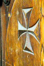 cross on a wood door 