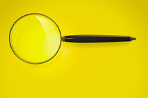 magnifying glass on a yellow background 