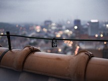 love lock on a rooftop railing 