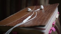 earbuds on a Bible Reading an audio bible