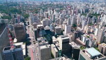 Sao Paulo Brazil. Aerial view from Paulista Avenue at downtown Sao Paulo Brazil. Avenida Paulista. Transportation scenery. Business office buildings. Cityscape Paulista Avenue at Sao Paulo Brazil.
