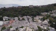 Fly over old Gjirokastër city to historic ottoman fortress, Albania