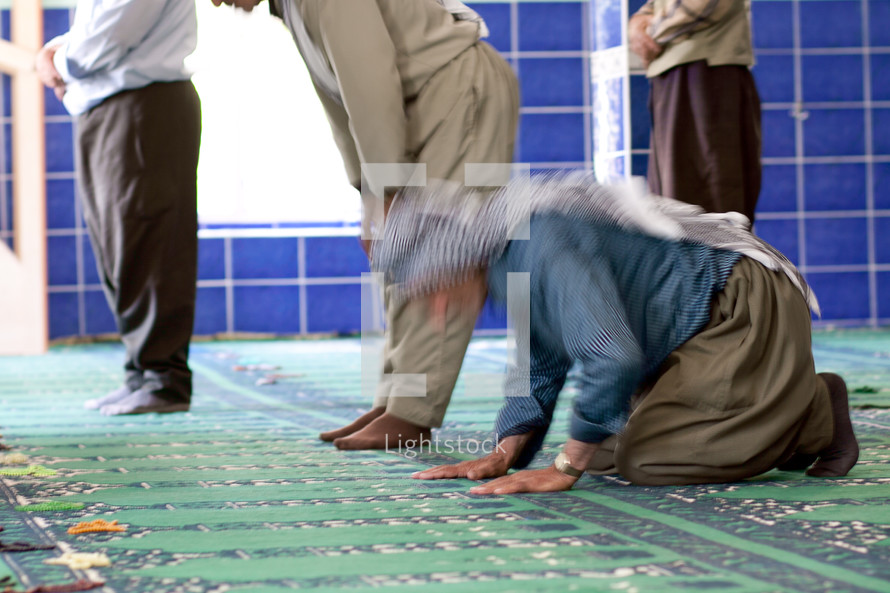 Kurdish man praying at Mosque in southeast Turkey