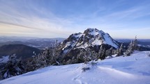 Rocky peak in winter landscape. Snowy mountain nature in the national park