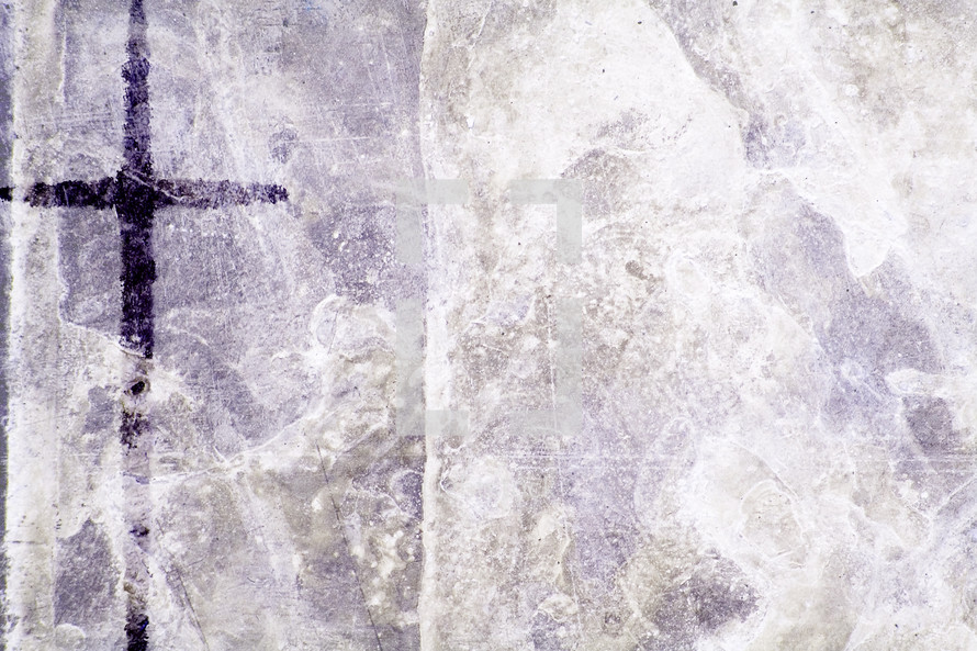 purple cross on rough texture surface