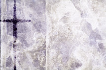 purple cross on rough texture surface