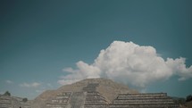 Quaint View Of A Pyramid And Cloudy Sky In Teotihuacan Complex, Mexico	