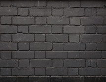 Black brick wall useful as a background