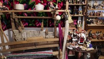 Assorted Display Of Romanian Traditional Items And Souvenirs In A Shop, Odaia Bunicii Voronet, Romania. - Panning Right