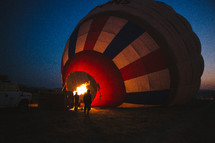 flames igniting a hot air balloon 