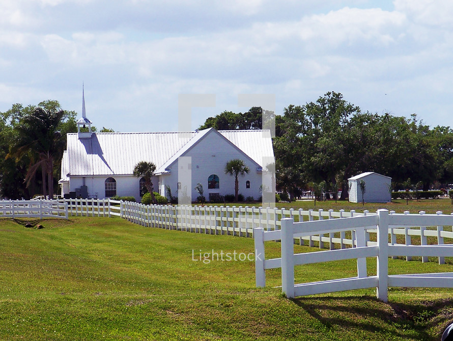 country church with white picket fence 