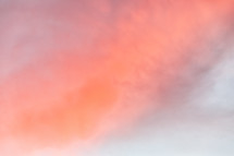 pink clouds in the sky at sunset 