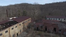 aerial view over an abandoned warehouse building 