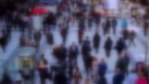 Unrecognisable blurred crowd of people low motion