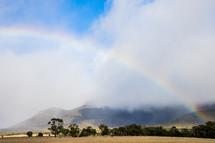 rainbow over a mountain 