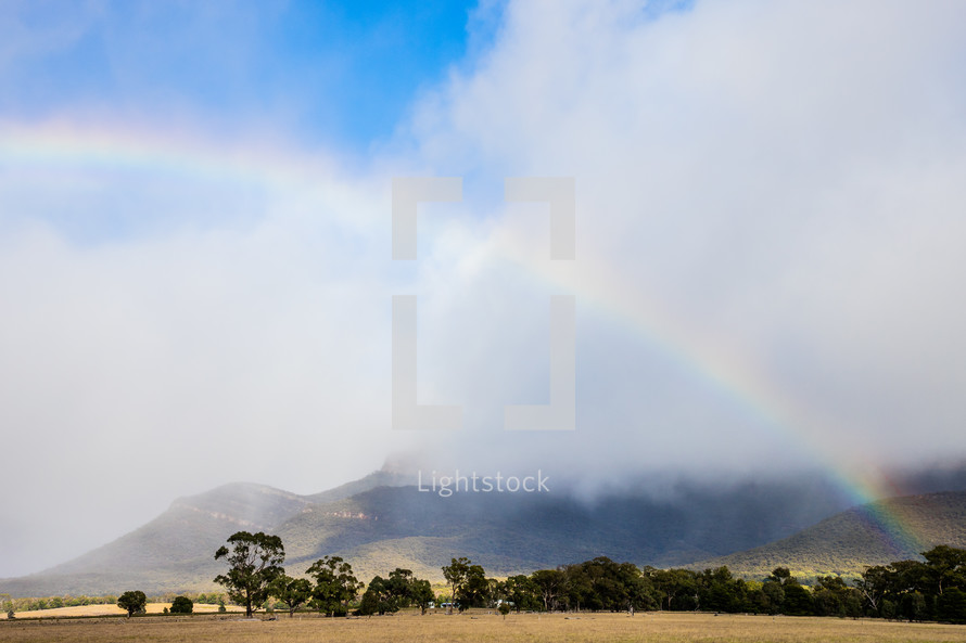 rainbow over a mountain 