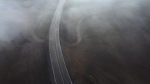 Cars on the foggy road