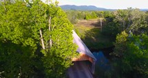 aerial view over a covered bridge 