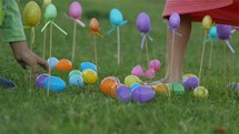 children gathering Easter eggs 