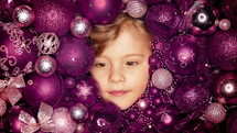 Toddler boys face lights up with joy in Christmas tree toys balls. Wonder, happiness mood. Touch of magic Holiday-themed projects, family-focused content or sentimental storytelling.