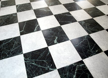 Black and white checked floor useful as a background