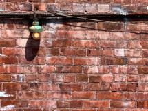 lamp on a brick wall 
