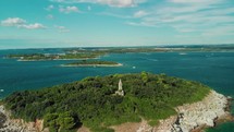 drone films the sea on the coast of istria with an old church tower