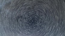 Startrails Astronomy Time lapse Comet effect of Star trails rotate circle in Dark Night sky
