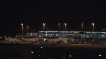 Airport terminal at night.