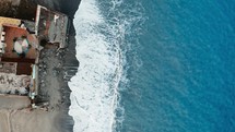 Aerial view of an ocean damaged building.