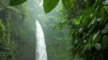 Aerial view of Bali Sekumpul waterfall in lush tropical forest 4k
