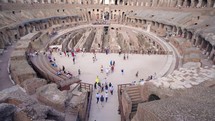  Interior view of the Colosseum an ancient amphitheater in Rome, establishment shot
