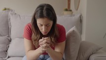 Religious adult woman praying
