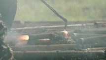 Torcher in Slow Motion, Torching Metal at a Scrapyard