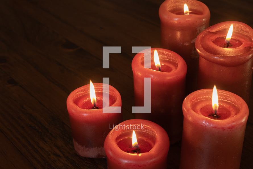 red candles burning 