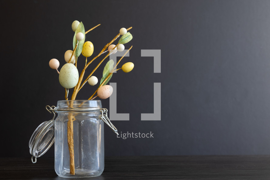 jar with Easter eggs branches 