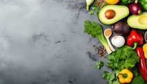 Healthy food background. Fresh vegetables and fruits on black stone table. Top view with copy space
