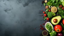 Healthy food background. Vegetables, herbs and spices on dark background. Top view with copy space