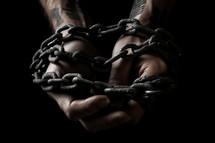 Hands Wrapped in Chains