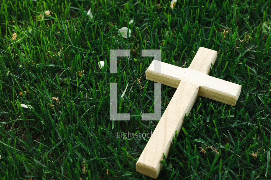 a cross in the grass 