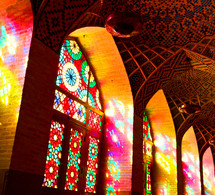 sunlight shining through stained glass windows into a mosque in the Philippines 