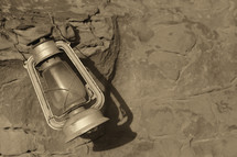 old lantern on a rock 